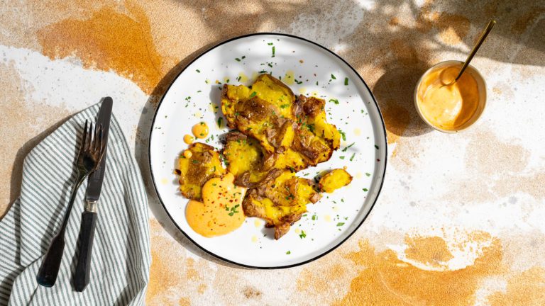 smashed potatoes served with harissa mayo