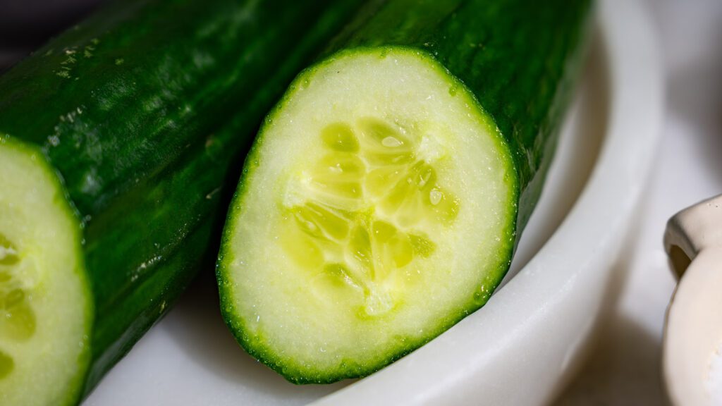 Sliced cucumber in profile. The core can be seen.